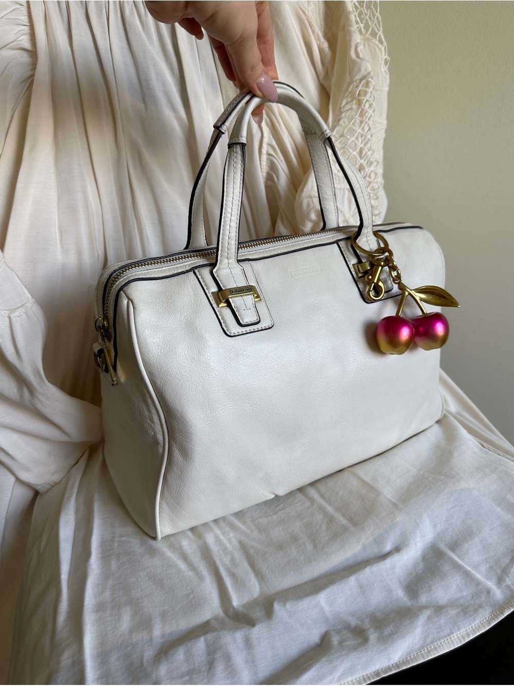 Coach Taylor Leather Satchel in ivory leather with gold-tone hardware and Charm